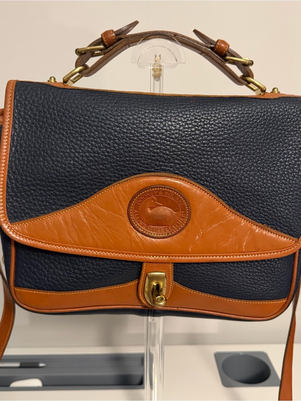 Dooney & Bourke Black and Brown Leather Satchel with Brass Hardware